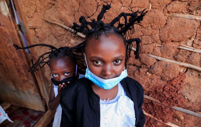 Kiểu tóc phổ biến nhất ở khu ổ chuột tại Kenya được lấy cảm hứng từ virus corona - Ảnh 2.